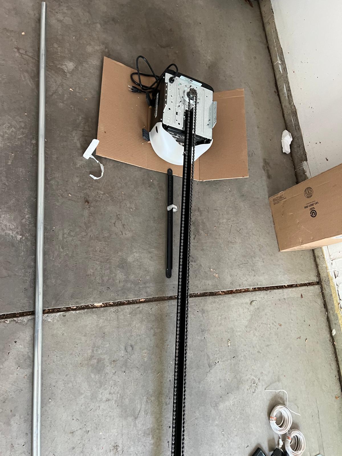 Torsion conversion spring and garage door opener replacement in Lafayette CO (2)