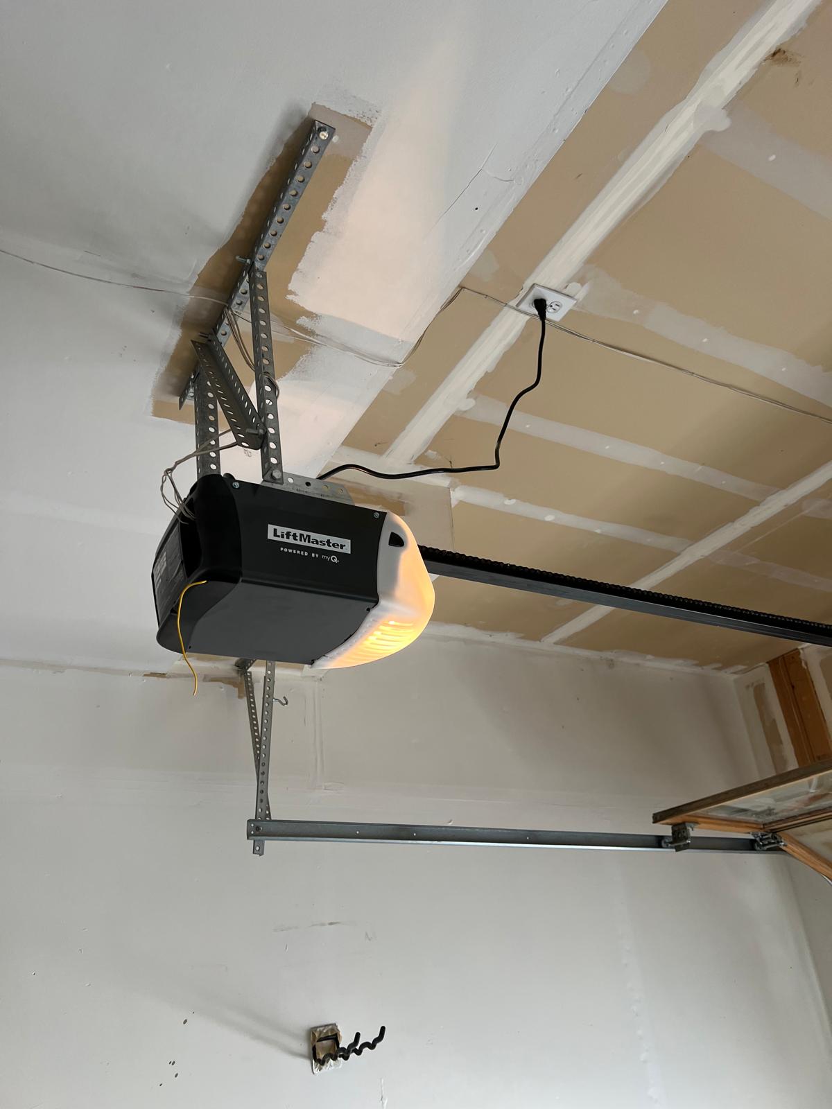 Torsion conversion spring and garage door opener replacement in Lafayette CO (6)