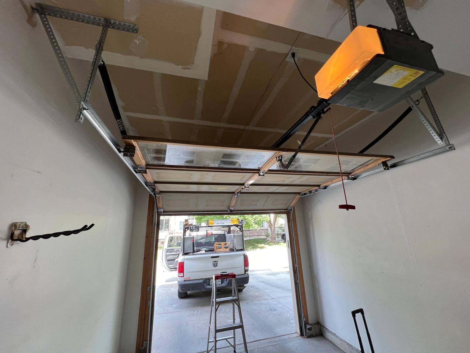 Torsion conversion spring and garage door opener replacement in Lafayette CO (8)