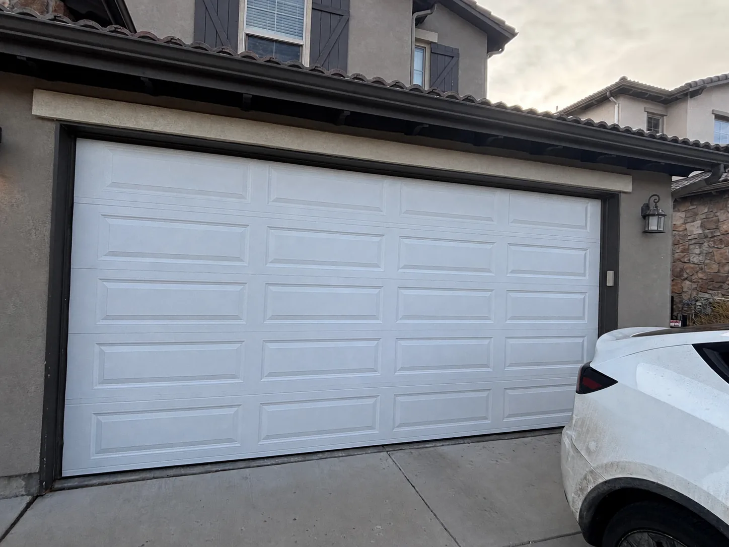New sectional garage door installed in a Denver-area home